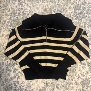 Stylish Black and Cream Striped Turtleneck Sweater